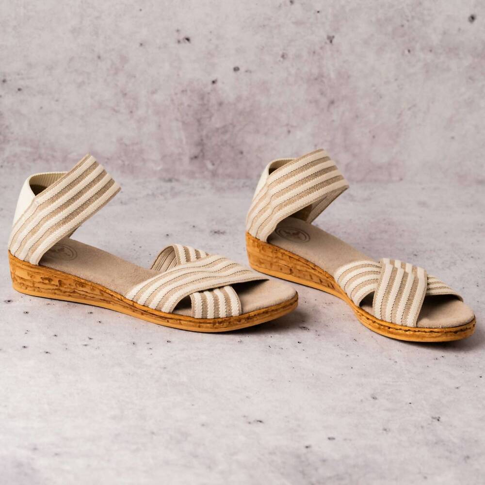 NEW CHARLESTON SHOE CO. women's low wedge sandal in cream